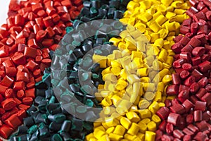 Colorful plastic polymer granules