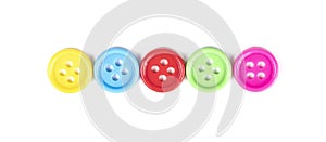 Colorful plastic sewing buttons isolated on white