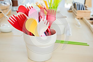 colorful plastic spoon and fork