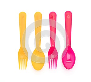 colorful plastic spoon and fork
