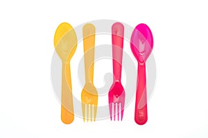 colorful plastic spoon and fork