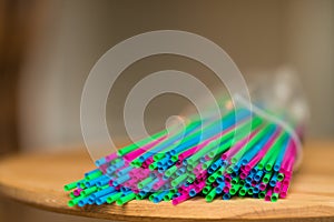 Colorful plastic straws close up, concept of ban act for plastic packaging in Europe 2019, with free space for your text