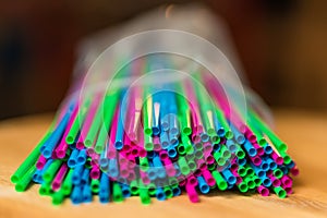 Colorful plastic straws close up, concept of ban act for plastic packaging in Europe 2019, with free space for your text