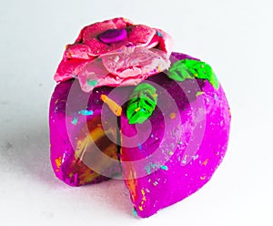Colorful Plasticine or Clay cake with red rose