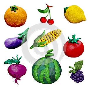 Colorful plasticine handmade 3D fruit and vehetables icons set isolated on white background photo