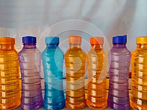 Colorful platic water bottles filled with water