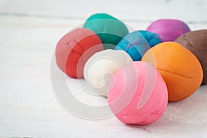 Colorful playdough balls photo