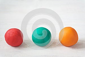 Colorful playdough balls photo