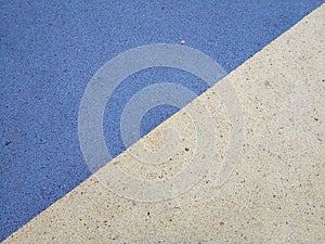 Colorful playground background. Grey-blue rubber outdoor playground