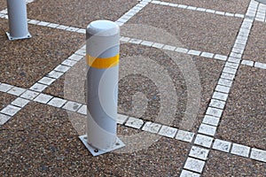 Colorful poles and curbs along the sidewalk in a big city in Israel