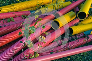 Colorful polyvinyl plumbing pipes in evening light