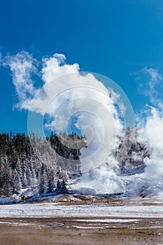 Colorful Porcelain Basin area trail with steaming vents and fumaroles in Yellowstone National Park, Wyoming