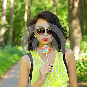 Colorful portrait of young funny fashion girl posing in summer style outfit