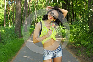 Colorful portrait of young funny fashion girl posing in summer style outfit