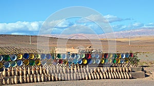 Colorful pottery displayed outdoor in High Atlas Mountains in Morocco