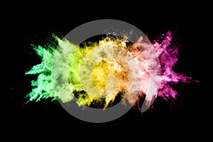 Colorful powder explosion on black background.