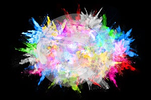 Colorful powder explosion on black background.