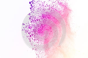 Colorful of powder explosion on white background. Colored dust