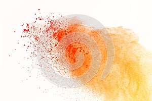 Colorful of powder explosion on white background. Colored dust e