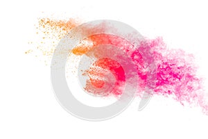 Colorful powder explosion on white background.Pastel color dust particle splashing