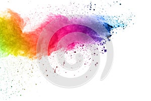 Colorful powder explosion on white background.Pastel color dust particle splashing