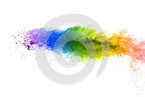 Colorful powder explosion on white background.Pastel color dust particle splashing