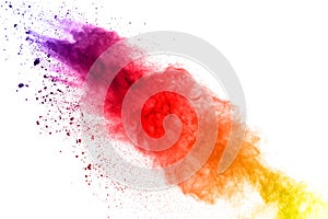 Colorful powder explosion on white background.Pastel color dust particle splashing