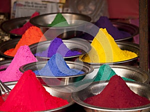 Colorful powders at a market in Orchha, India