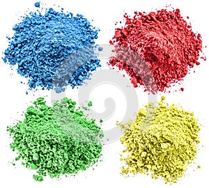 Colorful powders on the white background