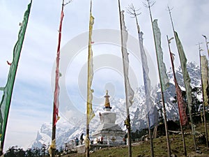 Colorful Prayer Flags Flutter Amid Mountains On Backdrop