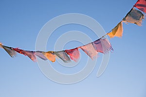 Colorful prayer flags, fluttering in the wind