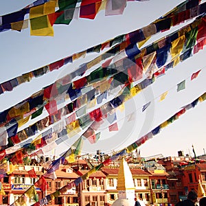 Colorful praying flags on the Boudhanath Stupa - vintage filter.