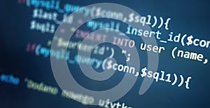 Colorful programming php and html code on a monitor. PHP language code closeup. Backend programming, software development concept