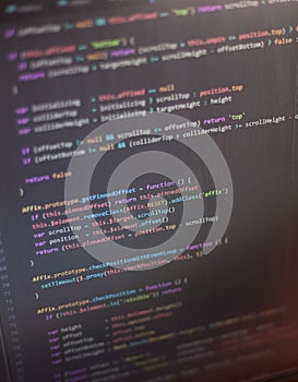 Colorful programming php and html code on a monitor.