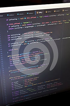 Colorful programming php and html code on a monitor.