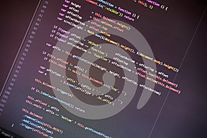 Colorful programming php and html code on a monitor.
