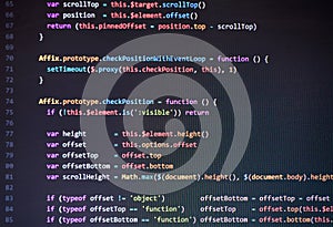 Colorful programming php and html code on a monitor.