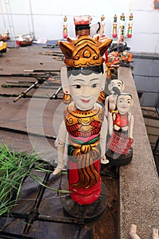 Colorful puppets made of fig tree wood at Hoi An Water Puppet Theater, Vietnam