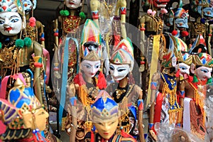 Colorful puppets on stall in Bali photo
