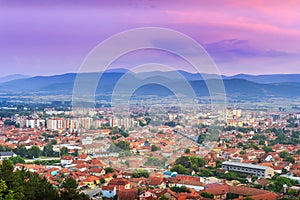 Colorful purple sunset sky over Pirot city