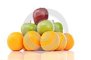 Colorful pyramid of fruits of orange and apple