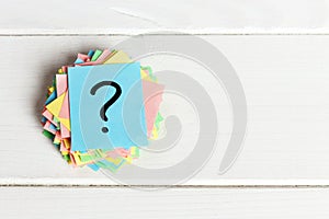 Colorful question marks written reminders tickets. ask or business concept