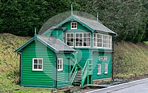 Colorful railway signal box in rural setting