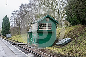 Colorful railway signal box in rural setting