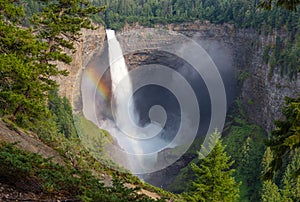 Colorful rainbow around the tumbling waters of Helmcken Falls, BC