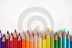 Colorful rainbow pencils, bright spectrum background