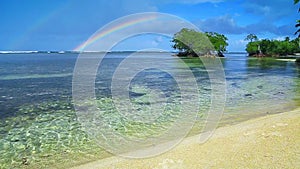 Colorful rainbow over caribbean sea .