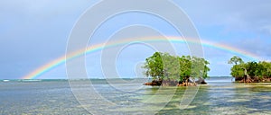 Colorful rainbow over caribbean sea .Travel background.