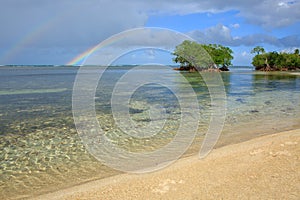 Colorful rainbow over caribbean sea .Travel background.