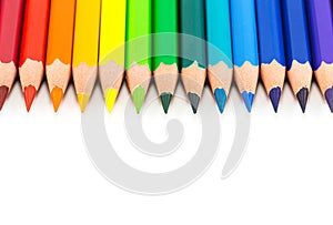 Colorful rainbow pencils on a white background